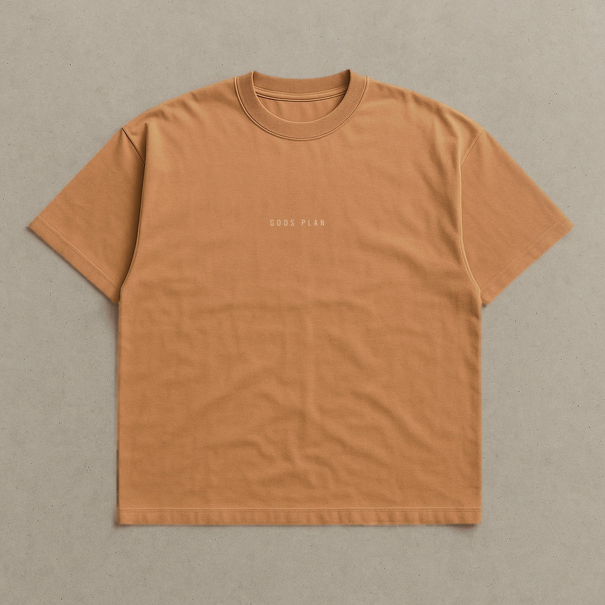 The Plan Isn't Yours — Oversized Tee — Toast, front — GODS PLAN